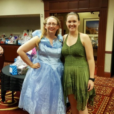 Tinkerbell and Cinderella attend the princess party.